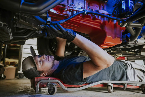Mechanic installing Copper Nickel Brake Line Replacement Kit 3/16 x 25 ft with Inverted Flare Fittings under vehicle