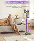 Game Changing Cordless Vacuum Cleaner With Killer Fifty Five Kpa Suction and Heavy Duty Six Hundred Watt Brushless Motor self-standing next to a woman relaxing on a couch.