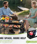 Upgraded Folding Grill Table For Outdoor BBQs Metal Portable Camping Table With Three Height Settings in outdoor use by a lake