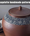 Level Up Your Pantry Setup With This Handmade Ceramic Food Storage Jar Featuring An Airtight Lid To Keep Flour Sugar Coffee Beans And Candy Fresh As New While Dropping Some Serious Cozy Vibe On Your Kitchen Counter. Close-up of a ceramic jar with floral patterns and a snug lid.