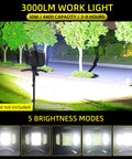 Rechargeable 30W LED Work Light With 3000 Lumen Output illuminating outdoor area, shown on stand with brightness modes