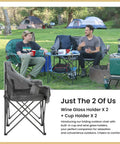 Two men sitting in a Portable Folding Double Duo Camping Chair Loveseat For Two with wine glass holders at a campsite.