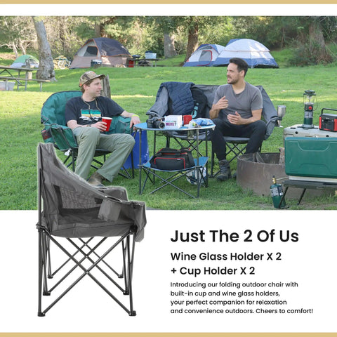 Two men sitting in a Portable Folding Double Duo Camping Chair Loveseat For Two with wine glass holders at a campsite.