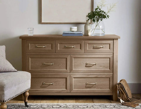 Flint Gray Oil Based Wood Stain One Quart Penetrating Finish For Furniture And Cabinets applied on a dresser with six drawers.