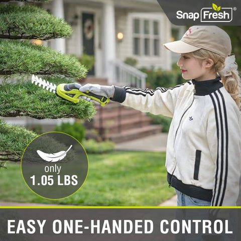 Person using Cordless Grass Shear And 2 In 1 Hedge Trimmer For Easy Yard Care near a bush, highlighting easy one-handed control.