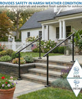 Hella Sturdy Aluminum Round Stair Handrail Kit For Indoor Outdoor Steps And Porch Deck With Rock Solid 800 Pound Load Capacity Built Tough Textured Black Railing mounted on stone steps in a garden.