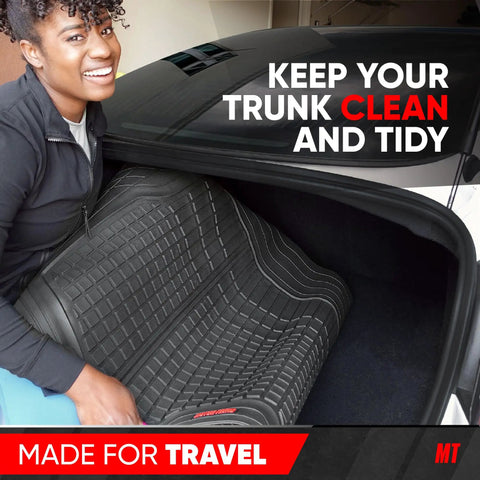 Built Tough Heavy Duty Trimmable Cargo Mat Liner With Deep Traction Grips For Dirt Defying Protection And Spill Proof Coverage In Classic Black For Cars Trucks And Suvs placed in a trunk.