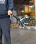 Telescoping Magnetic Pickup Tool With 50 Pound Holding Power, 36.5 Inch Extendable Magnet Wand collecting metal in warehouse