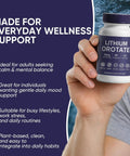 Hand holding a bottle of 10mg Lithium Orotate Anxiety And Mood Support Capsule For Stress Relief And Chill Mood Boost Vegan Non-GMO Gluten Free Formula Brain Health Boost 90 Easy To Swallow Capsules For Daily Wellness.