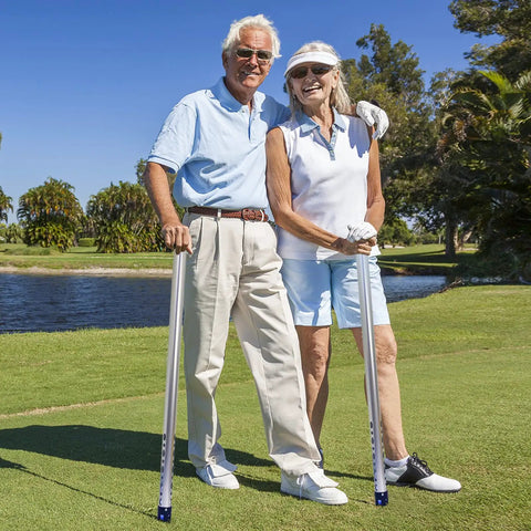 Two Pack Golf Ball Retriever Set Aluminum Alloy 38.6 Inch Ball Collector Grabber Silver Finish in use by two golfers on course