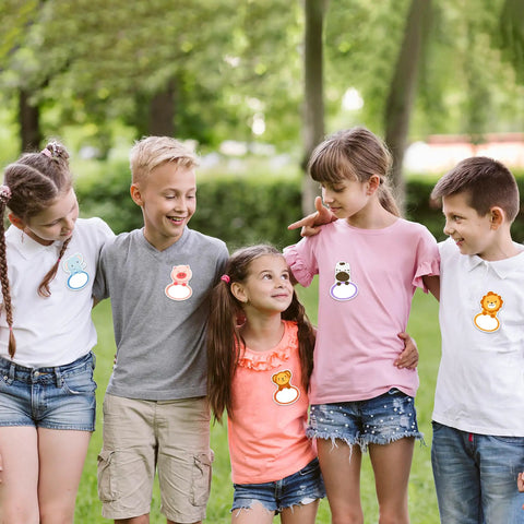 Kids wearing 135 Jungle Animal Name Tag Stickers for Kids and Students Cute and Fun Classroom Name Labels for Back to School.