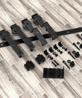 Bypass Mini Barn Door Hardware Kit with Double Sliding Rollers in Black Powder Coat, Solid Steel Construction on floor display.