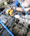 Driveway Ready Heavy Duty Foldable Engine Hoist Crane Lifter With 2200 Lbs Capacity Rust Resistant Carbon Steel Shop Jack in use over an engine.
