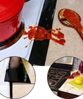 Spilled sauce on stove with Stove Covers Set Eight Pcs 0.2mm 10.6x10.6 Inch Gas Range Protectors With Two Pcs 21 Inch Silicone Gap Covers.