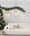 Living room with holiday decor featuring Peel And Stick Brick Wallpaper Light Grey Faux Brick Contact Paper 35.4 X 118.1 Inches