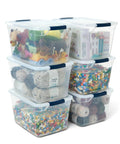Clear 32 Qt Stackable Storage Bins With Lids 6 Pack For Closet And Laundry Organization Durable Plastic Containers With Recessed Handles And Lay Flat Latches Great For Home Storage And Easy Stacking, filled with toys and yarn.