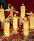 Set Of 4 White LED Flameless Pillar Candles, 2.5 Inch Diameter By 7 Inch Tall, flickering on a festive tabletop display
