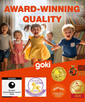 Children playing joyfully in a room, showcasing award-winning quality by Goki with multiple accolades displayed.
