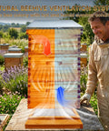 Beekeeper beside Two Pack Langstroth Bee Hive Bottom Board with cedar, beeswax coating, metal screen for ventilation, outdoors