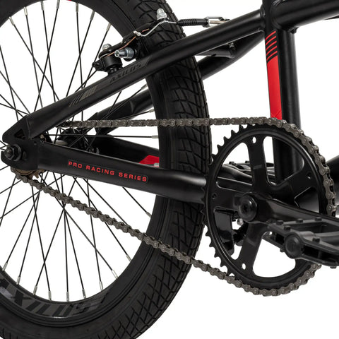 Close-up of rear wheel and chain on Axilus Kids BMX Bike For Intermediate Riders With 20 Inch Wheels, sturdy steel frame, single speed.