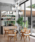 Hand Blown Glass Pendant Lights Over Kitchen Island With Seeded Bubbles Globe Lamp, Clear 8.7 Inch Diameter, Adjustable 60 Inch Cord