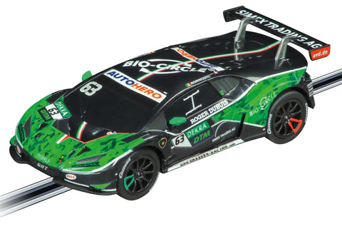 Lamborghini Huracan Mirko Bortolotti No 63 1:43 scale analog slot car on Carrera GO track, green and black design visible