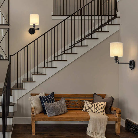 Plug In Wall Light Set Of 2 With Swing Arm Design, Linen Lampshades, Modern Bedroom Wall Sconces For Reading, Hallway And Living Room, 270 Degree Adjustable Head, Easy Install, Cozy Accent Lighting illuminating a staircase and seating area.