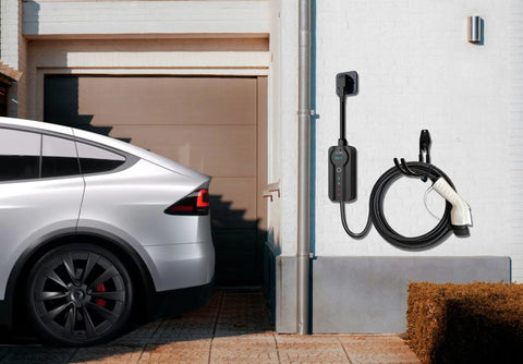 Straight Up Solid Heavy Duty J Hook EV Charger Holder Wall Mount with EV cable neatly organized on garage wall.