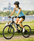 Person riding 7 Speed Mountain Bike 26 Inch Dual Suspension MTB For Men Women Adults, Heavy Duty High Carbon Steel Frame, Black