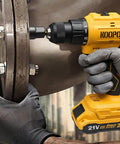 Person using Go To Magnetic Impact Nut Driver Set With Metric And SAE Bits Quick Release Extensions on metal surface