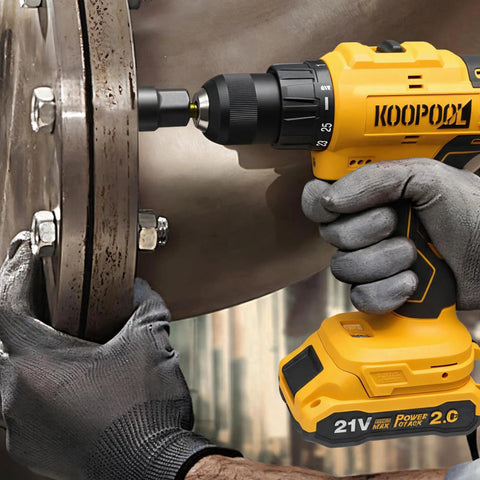 Person using Go To Magnetic Impact Nut Driver Set With Metric And SAE Bits Quick Release Extensions on metal surface