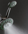 Antimicrobial Anti Clog 30 Setting High Pressure Rain Shower Head With Microban Nozzle Protection in use, oil rubbed bronze finish.