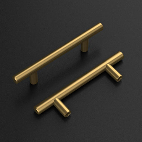 Two brushed brass handles from 25 Pack 10 Inch Brushed Brass Cabinet Handles Set For Kitchen Cabinets And Drawers Bathroom Vanities And Dressers Premium Stainless Steel Hardware Durable Gold Tone Pulls With Easy Screwdriver Install on black surface