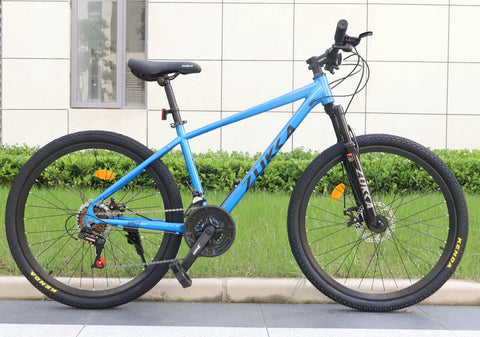 Blue mountain bike side view showcasing the Three By Six Seven Eight Speed Mountain Bike Crankset 170mm With 42 34 24T Chainrings