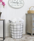 16 Inch Metal Wire Basket With Linen Fabric Liner And Side Handles For Laundry And Home Storage in a laundry room