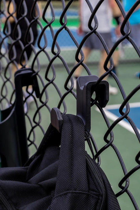 Chain Link Fence Hook For Sports Bags With Paracord Lanyard Heavy Duty Fence Hanger For Baseball Softball Tennis And Pickleball Gear Keeps Gear Clean Off The Ground During Games And Practices installed on fence