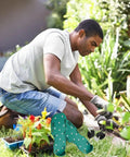 Man gardening with Garden Aerator Shoes With Adjustable Straps And Non Slip Spikes For Lawn Aeration And Yard Soil Health No Brainer