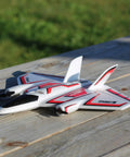 Ultra Micro RC Plane With Dope Twin Brushless Motors And Delta Wing BNF Basic Electric in white and red on wooden table