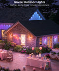 Next Level Outdoor Wall Lights Two Pack Smart RGBIC Porch Fixtures Hella Bright Waterproof Patio Bulbs App Controlled landscaping in an evening setting.