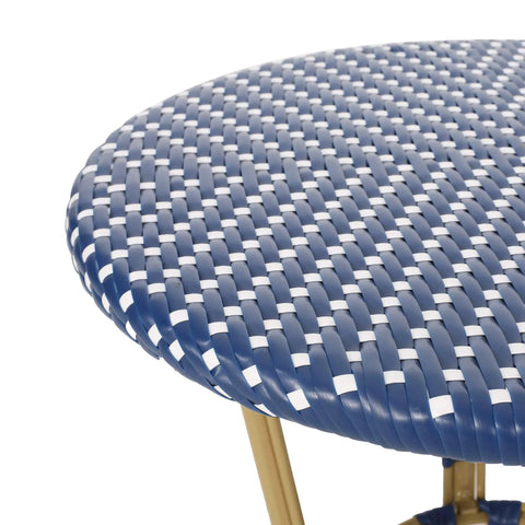 Close-up of Picardy Outdoor Bistro Table in Dark Teal White and Bamboo Print Finish showing wicker top and aluminum frame details.