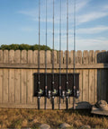 Heavy Duty Fishing Rod Holder Wall Mount For Garage Or Shed, 5-Rod Iron Rack With Reel Slots, installed on fence outdoors