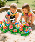 Two children playing with Flower Garden Building Kit For Kids 3 To 7 Years Old With 148 Piece Set And Storage Case in sandpit.