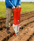 Person using 2 In 1 Seed And Fertilizer Planter For Corn Peanuts And Soybeans Hand Push With Adjustable Depth Manual Sower Easy Setup