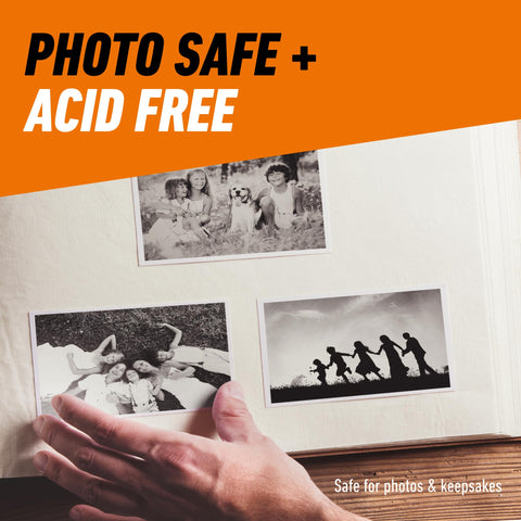 Hand placing photo into album, highlighting photo safe, acid-free feature of Clear Double Sided Adhesive Dots 0.5 Inch Diameter