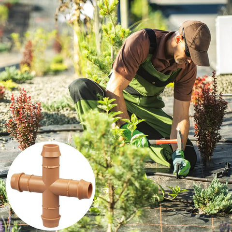 Gardener installing 12 Pack 1/2 Inch Drip Irrigation Cross Connectors Four Way Tee Barbed Hose Fittings for 1/2 Inch Tubing, easy install.