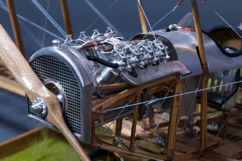 Close-up of Curtiss JN-4D Jenny 1:16 Scale Model Kit with laser cut basswood and metal engine details, historically accurate.