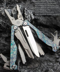 Camouflage Titanium Multitool Pliers Built Beefy With 420 Stainless Plier Head And 440 Steel Accessories on black stone