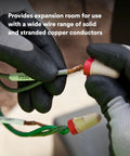 Hands connecting wires with Performance Plus Wire Connectors T And R Jug Tan Red 22-8 AWG. UL Listed, CSA Certified.