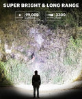 Rechargeable Flashlights 99000 Lumens Super Bright LED With 15 Hour Runtime 5 Modes IPX7 Waterproof Handheld shining on a hillside
