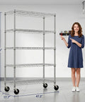 Woman pointing at Five Tier Wire Shelving Unit With Wheels Beefy Heavy Duty Metal Storage Rack for garage, 75.6 inches tall.